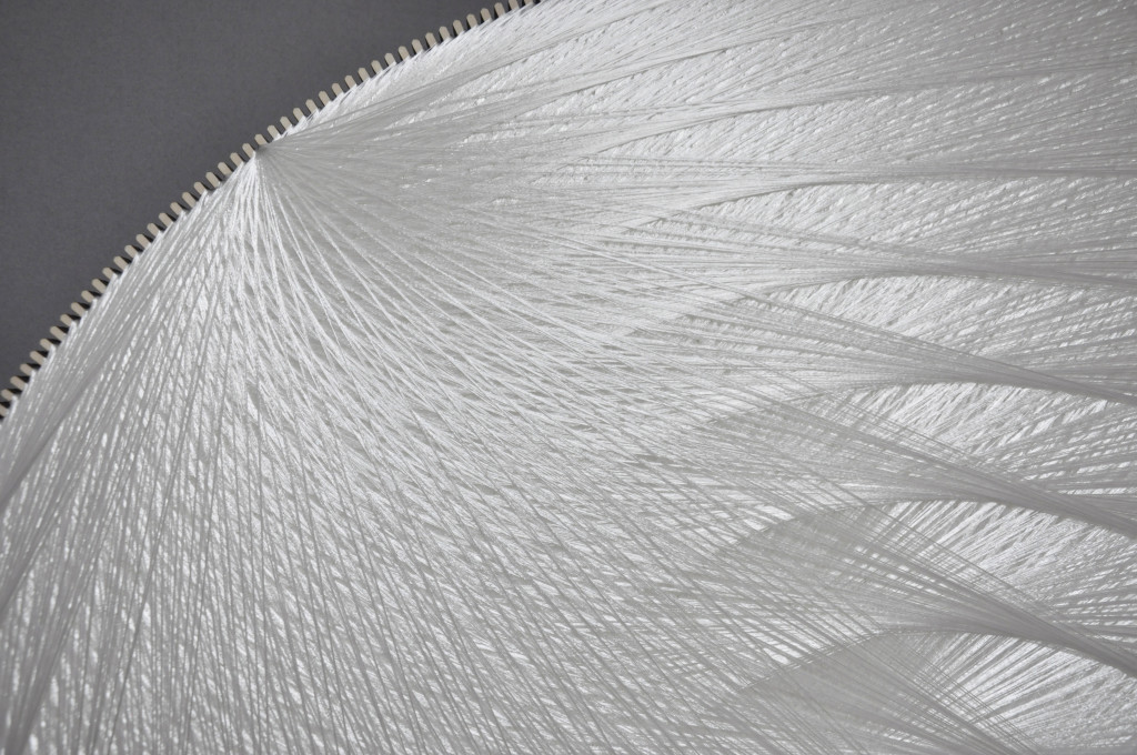 Thread sculpture, sound-absorbing
Polyester thread, birchwood, polyester textile, glass wool
120 cm
Unique piece
