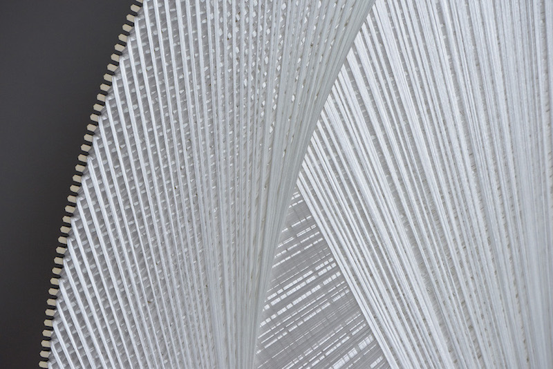 Thread sculpture, sound-absorbing
Polyester thread, birchwood, polyester textile, glass wool
Diameter 200 cm
Unique piece